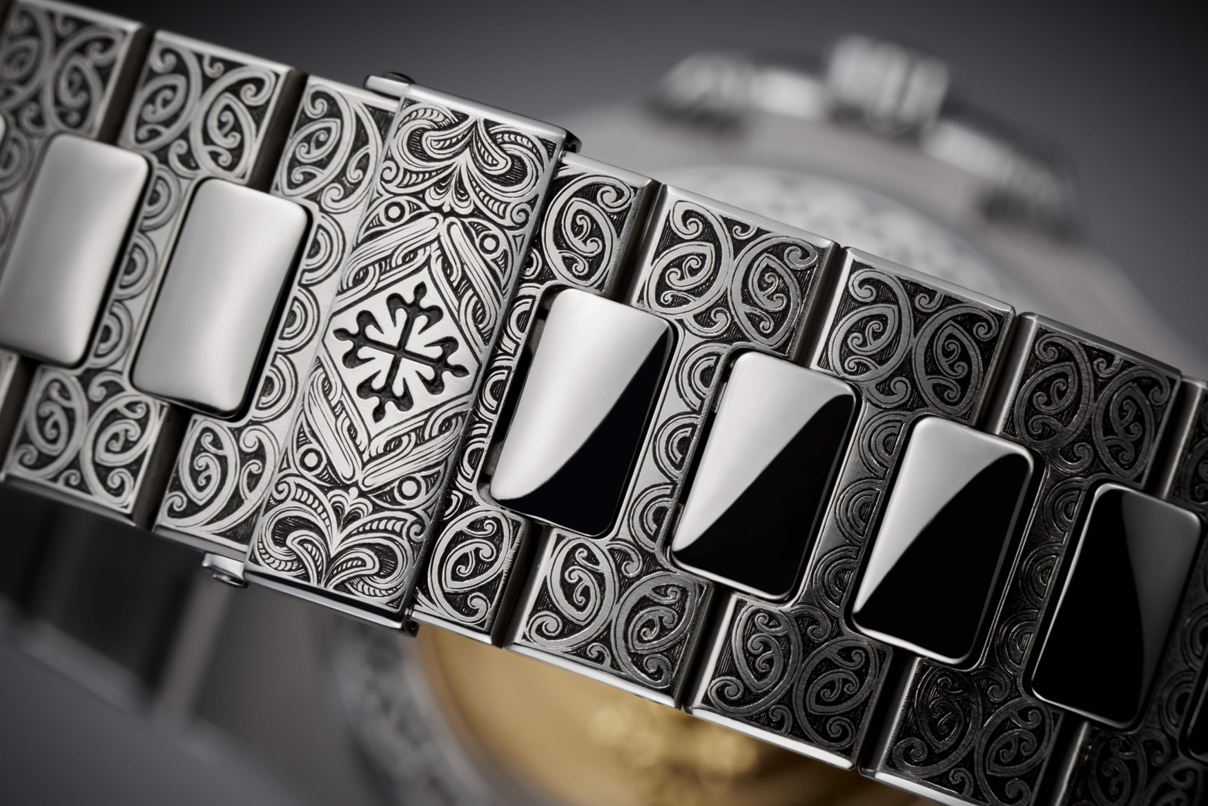 engraved Patek Philippe Nautilus bracelet